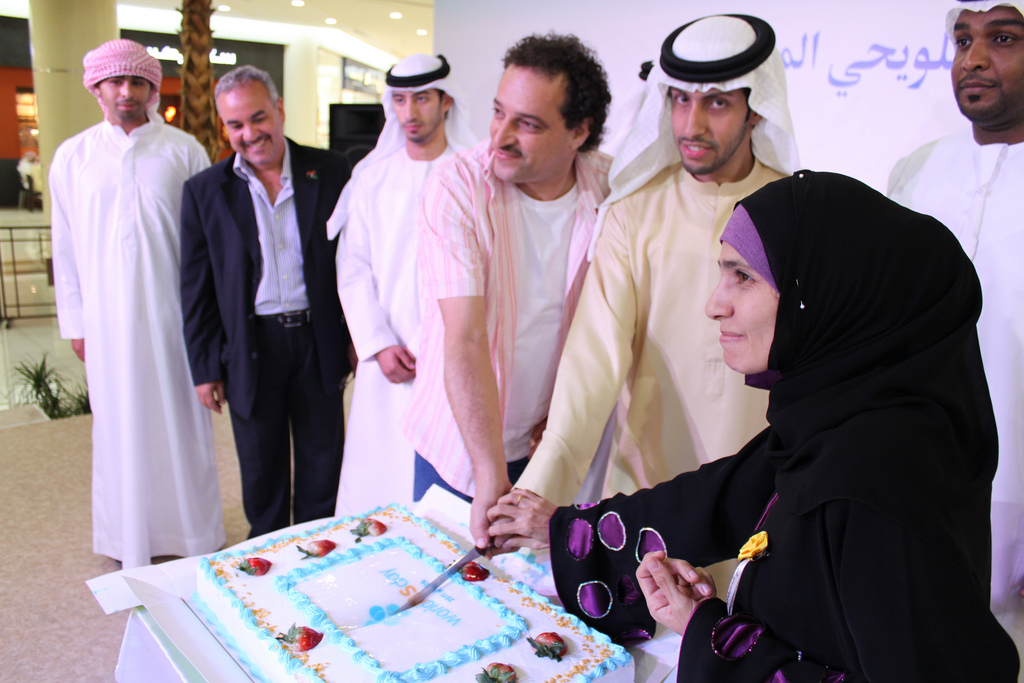 People with MS celebrate with shoppers in a busy mall in Al Ain, Abu Dhabi