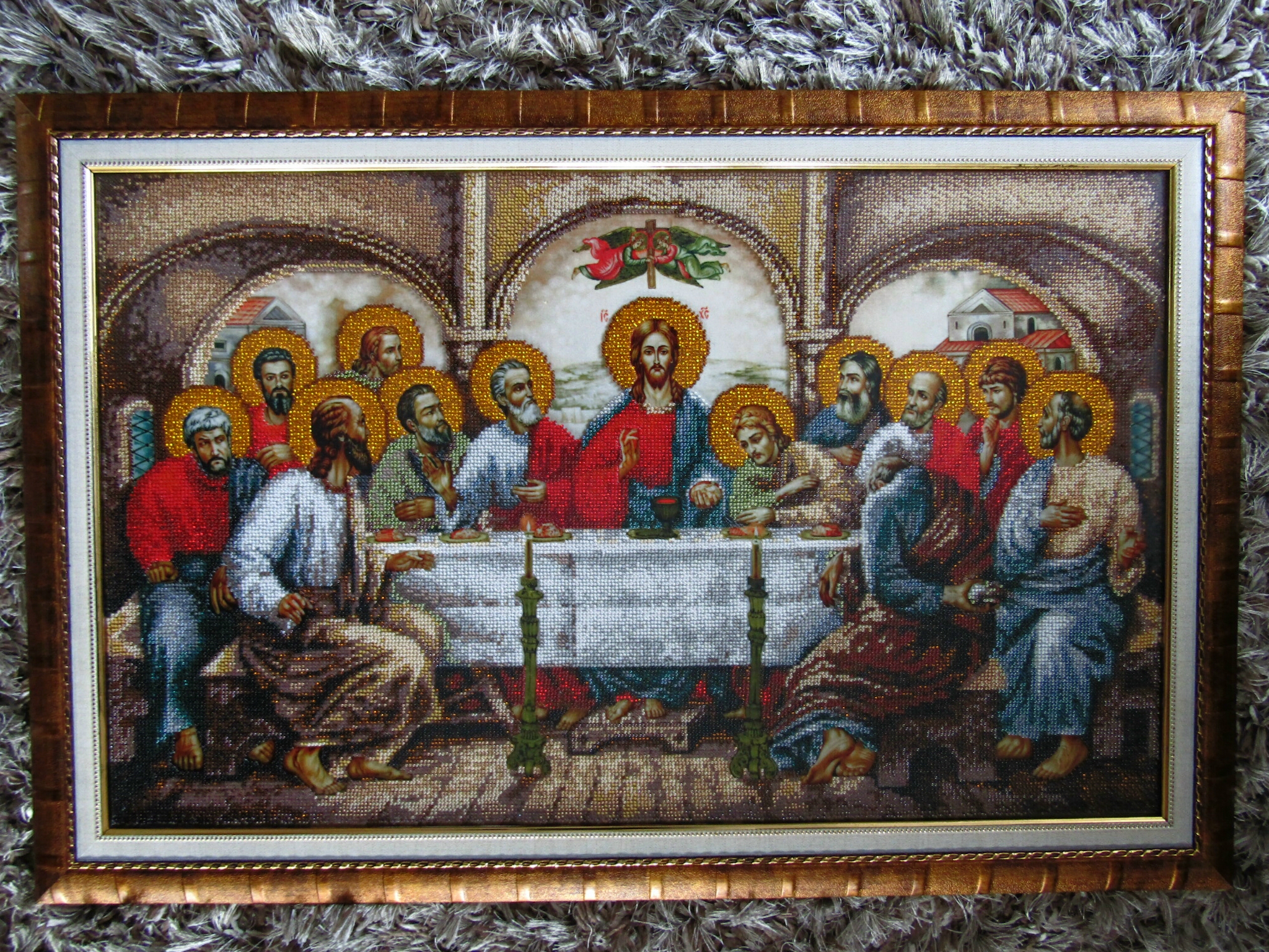 A tapestry image of Jesus at the last supper
